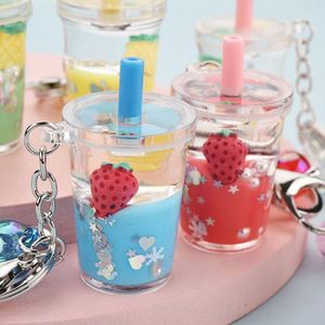 Factory Wholesale <b>Cute</b> Unicorn Bottle Keyholder Floating Keychain with Milk Tea Liquid Made of Zinc Alloy Plastic for <b>Keyring</b> - Product Image 5