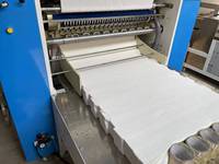 Machine automatique de pliage et de conversion de mouchoirs en papier pour l'emballage de boîtes de mouchoirs à grande vitesse