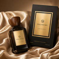 Flacon de parfum de luxe en verre de 100 ml avec bouchon en bois, étiquette métallique personnalisée et emballage cadeau haut de gamme