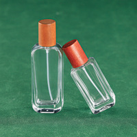 Emballage de bouteille de parfum à faible quantité minimale de commande de 30ml bouteille vide de parfum en verre bouteille de parfum élégante de 50ml avec bouchon en bois