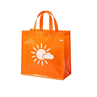 Sac à vêtements en non-tissé laminé avec sangle renforcée, logo personnalisé, emballage lourd pour vêtements