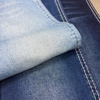 Tela vaquera elástica azul por delante y negra por detrás de 8.4oz de algodón, viscosa y spandex para shorts de mezclilla al por mayor
