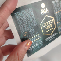 Étiquettes personnalisées en papier à texture perlée avec logo en feuille d'or en relief Autocollant adhésif de luxe pour produits cosmétiques SOINS DE LA PEAU Articles en rouleau