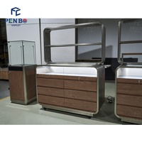 Meubles commerciaux de magasin de montre-bracelet personnalisés en bois MDF Led éclairage montre présentoir vitrine avec présentoir sur le dessus