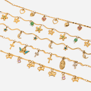 ชุดสร้อยข้อมือเสน่ห์สวยงาม โทนสีทอง จี้รูปหัวใจ ดอกไม้ และไม้กางเขน เครื่องประดับสำหรับผู้หญิง สวมใส่ได้ทุกวัน - Product Image 1