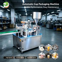 Machine de remplissage et de scellage automatique pneumatique à haute productivité pour les boissons au lait, au yaourt et autres boissons en gobelets en plastique pour cartons