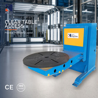 Positionneur de soudage rotatif avec mandrin de serrage pneumatique et table inclinable pour station de soudage de réservoirs et de cuves industrielles sous pression
