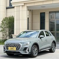 Audi Q3 d'occasion grise 2024 de luxe compacte haut de gamme, SUV turbo, 129 km, faible kilométrage, automatique, conduite à gauche, intérieur cuir foncé, vente en gros