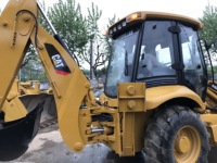 Chargeuse sur pneus Caterpillar 416E d'occasion de qualité supérieure, faible nombre d'heures de travail, peinture d'origine