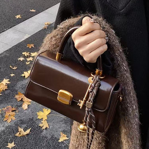 PU Leather Handbag with <b>Strap</b> <b>Buckle</b> and Metal Clasp Shoulder and Crossbody Design - Product Image 6