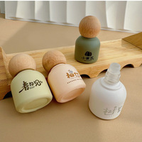 Mignon revêtement personnalisé de 30ml givré rose jaune vert rouleau de bouteille d'huile essentielle de parfum en verre sur des bouteilles avec bouchon en bois