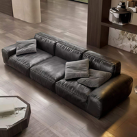 Grand canapé en cuir noir italien minimaliste, canapé design moderne et minimaliste en ligne droite, idéal pour grand salon de villa