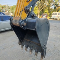 Excavatrice Hyundai 210W-7 d'occasion en bon état, efficace et fiable, avec des pièces de rechange de moteur excellentes