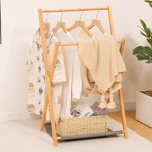 Simple and multifunctional <b>clothes</b> <b>rack</b> with cross-shaped design, perfect for bedside, bedroom, or children's use. - Product Image 3