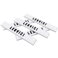 Etiquettes en PVC personnalisées Etiquettes avec logo en relief blanc Etiquettes en caoutchouc noir pour vêtement Etiquettes en silicone PVC pour vêtement