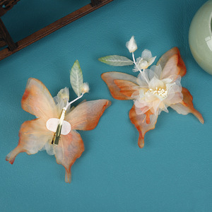 Accesorio para el Cabello Estilo Chino Antiguo 2024, Diseño Original, Hecho a Mano, Flor Perforada con Degradado Naranja y Mariposa - Product Image 3