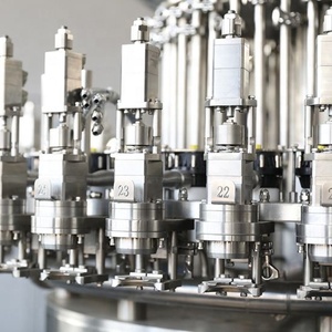 Máy đóng chai, chiết rót, đóng nắp, kết hợp nhiều chức năng (12000-36000 chai/giờ) dùng cho nước đóng chai, nước trái cây, nước có ga, cà phê, sữa, dầu. - Product Image 5