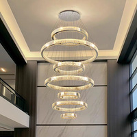 Lustre de plafond LED en cristal K9 argenté moderne et luxueux pour hall d'hôtel, villa, salon, bar, loft, escalier, suspension en forme d'anneau