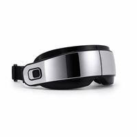 Masseur oculaire intelligent noir avec chaleur, vibrations, brume, fonction musicale, rechargeable par USB pour une relaxation oculaire et un soulagement du stress à domicile