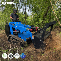 Mini-Kompaktlader mit Raupenfahrwerk und 25 PS Dieselmotor, inklusive Forstmulcher-Anbaugeräten