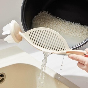 Cuillère à riz en plastique avec couvercle pour usage en cuisine - Product Image 1