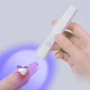 Vente en gros Mini lampe LED UV à main Sèche-vernis à ongles en gel Lampe à ongles à séchage rapide
