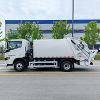 Camion compacteur de déchets électrique Geely 6 m³ 4x2 à compression bidirectionnelle, commande CAN, faible bruit, autonomie 260 km, fourni par l'usine