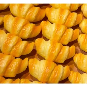 Vente en gros de jouets en forme de croissant anti-stress à récupération lente, doux et moelleux, réalistes, pour enfants - Product Image 4