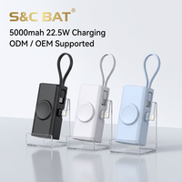 Batterie externe portable en plastique à charge rapide bidirectionnelle haute capacité 5000 mAh pour câble de charge de montre pour voyage d'affaires