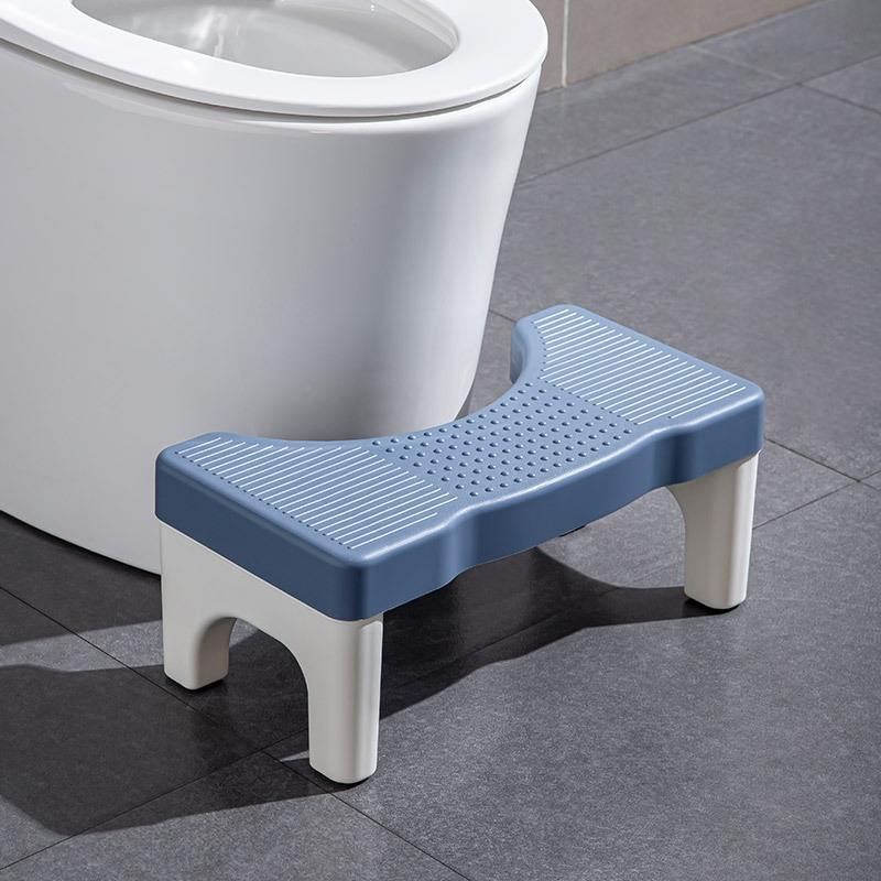 Stool with blue top and white feet