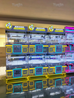 Nouveauté 2026 Mini machine d'arcade d'intérieur à monnayeur pour la distribution de jouets et de cadeaux, Mini machine à griffes pour poupées