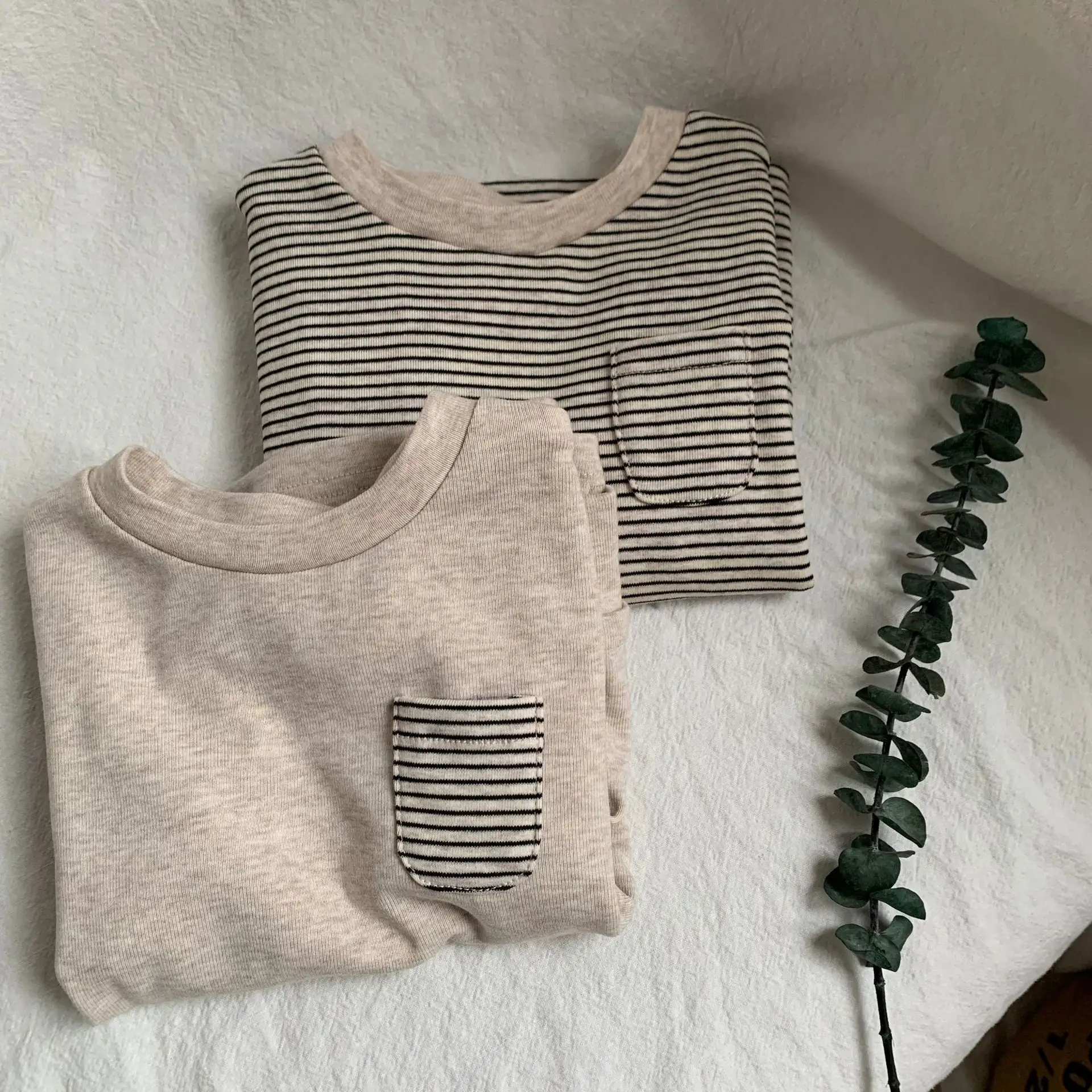 H111001autumn new boys' and girls' striped color matching small pocket long sleeve T-shirt children's loose casual top
