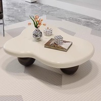 Table basse nuage minimaliste moderne en bois organique irrégulier avec pieds sphériques pour salon et appartement