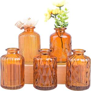 Vente en gros de <span class=keywords><strong>vase</strong></span> à fleurs en verre nordique pour mariage à la maison <span class=keywords><strong>vase</strong></span> en verre bouteille à fleurs ambre décoratif unique et créatif - Product Image 1
