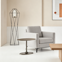 Table d'appoint ronde en métal élégante et minimaliste, gain de place, polyvalente, style italien moderne pour villa