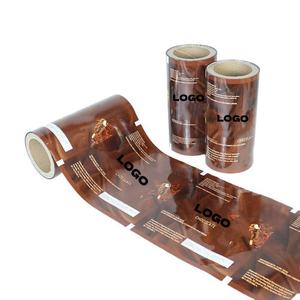 Rouleaux de film d'emballage en aluminium souple avec impression de logo personnalisé, film d'emballage pour biscuits et bonbons en PET/PE pour aliments - Product Image 1