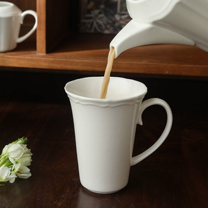 Bulk High Quality White Porcelain Mug, Embossed Scalloped Rim <b>Ceramic</b> Coffee <b>Cup</b> Custom Logo for Gift & Hotel - Product Image 1