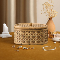 Boîte à bijoux décorative en osier tissé naturel faite à la main de forme ovale de luxe de vente chaude boîte de rangement de panier de décor à la maison avec couvercle
