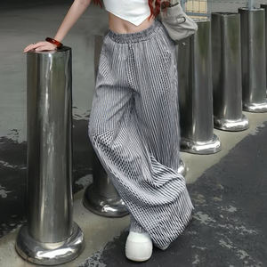 Pantalones casuales de cintura baja con textura de rayas simples, cintura elástica, bolsillos, fáciles de combinar, corte recto, holgados y largos. - Product Image 4