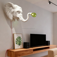 Lampe murale en forme d'éléphant en fibre de verre moderne, un élément de décoration intérieure élégant et tendance, lampe LED