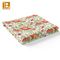 Tissu en coton peigné BILU, imprimé rétro floral aux grandes fleurs de grenade et fraises, style années 80, pour vêtements et matières textiles.