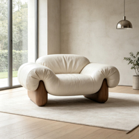 Fauteuil d'appoint moderne en cuir crème avec base en bois massif courbé, chaise longue individuelle rembourrée pour villa, salon, mobilier de maison