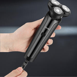 Afeitadora eléctrica AUX para hombres, afeitadora portátil recargable, resistente al agua, IPX7, cabezal flotante negro - Product Image 1