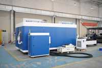Machine de découpe laser à fibre CNC entièrement fermée avec plateforme d'échange 3015 6025 pour acier inoxydable
