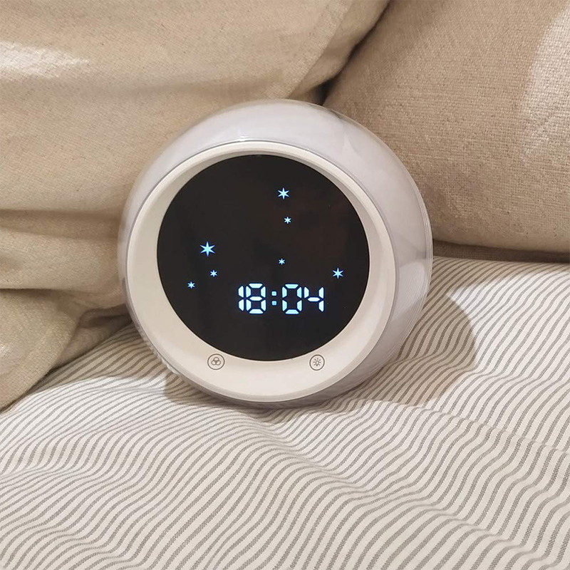 Mejor regalos de enseñar a los niños de dibujos animados Luna niños despierta luz y luz de noche reloj
