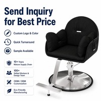 Fauteuil de barbier classique vintage, base ronde argentée et siège bicolore noir et blanc, pour équipement de salon, vente en gros.
