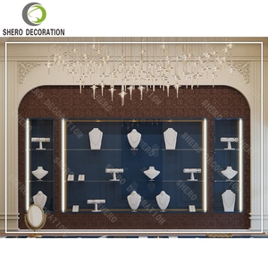 Vitrine à bijoux moderne en verre bleu avec éclairage LED, idéale pour la décoration de bijouterie. - Product Image 5