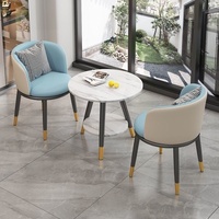 Ensemble de table et chaises de salon de style nordique en métal de luxe avec rangement mobile pour hôtel et maison d'hôtes
