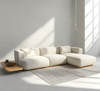 Canapé d'angle modulable de luxe moderne en tissu écologique capitonné pour salon de villa