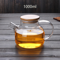 Carafe à eau/thé en verre borosilicate transparent de forme ronde de 34 oz (1000 ml) avec couvercle en bois, soufflée à la main, écologique